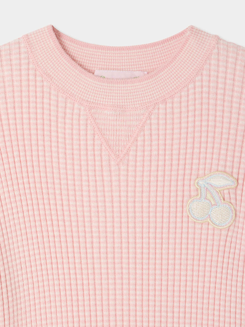 Pull en coton biologique avec patch cerise