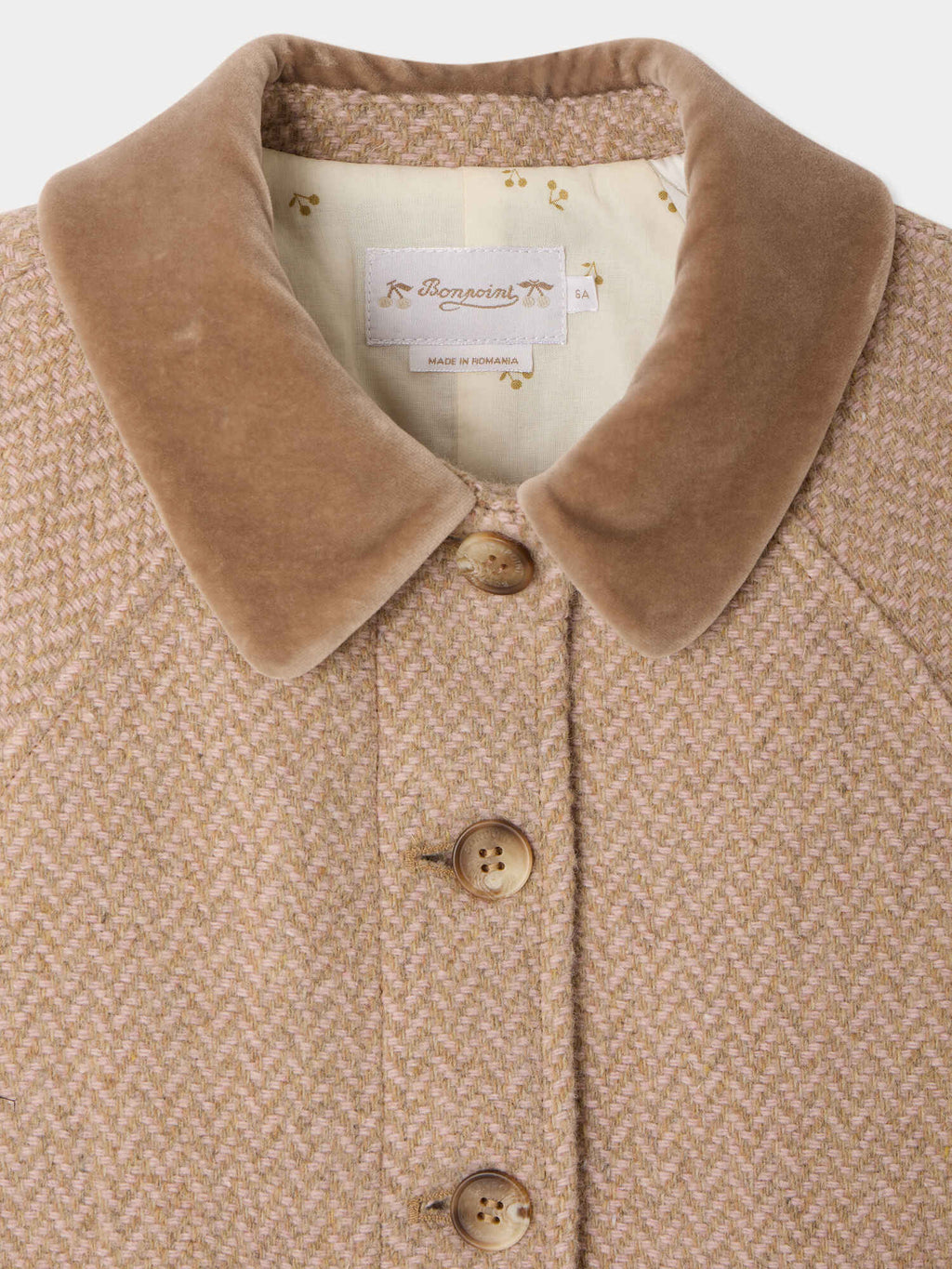 manteau à col de velours et doublure matelassée