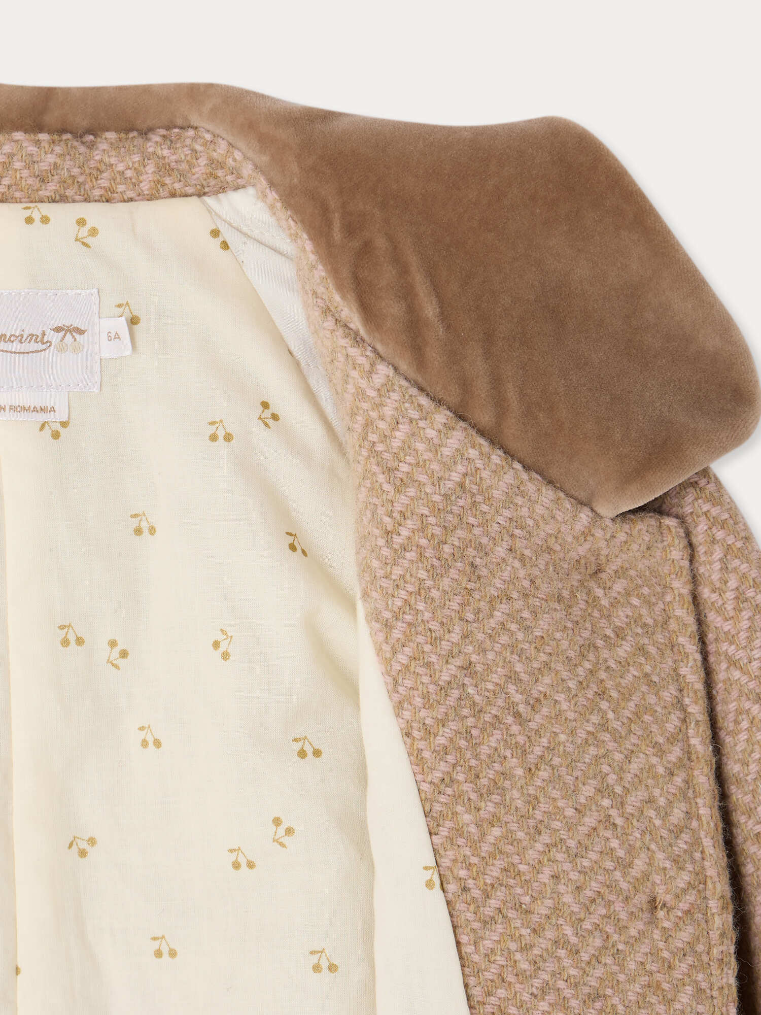 manteau à col de velours et doublure matelassée